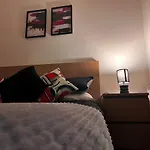 Vivid, Stylish, Central, Bold, Retro, Intimate, Red Accents, Striking Design, City Centre, 1Br